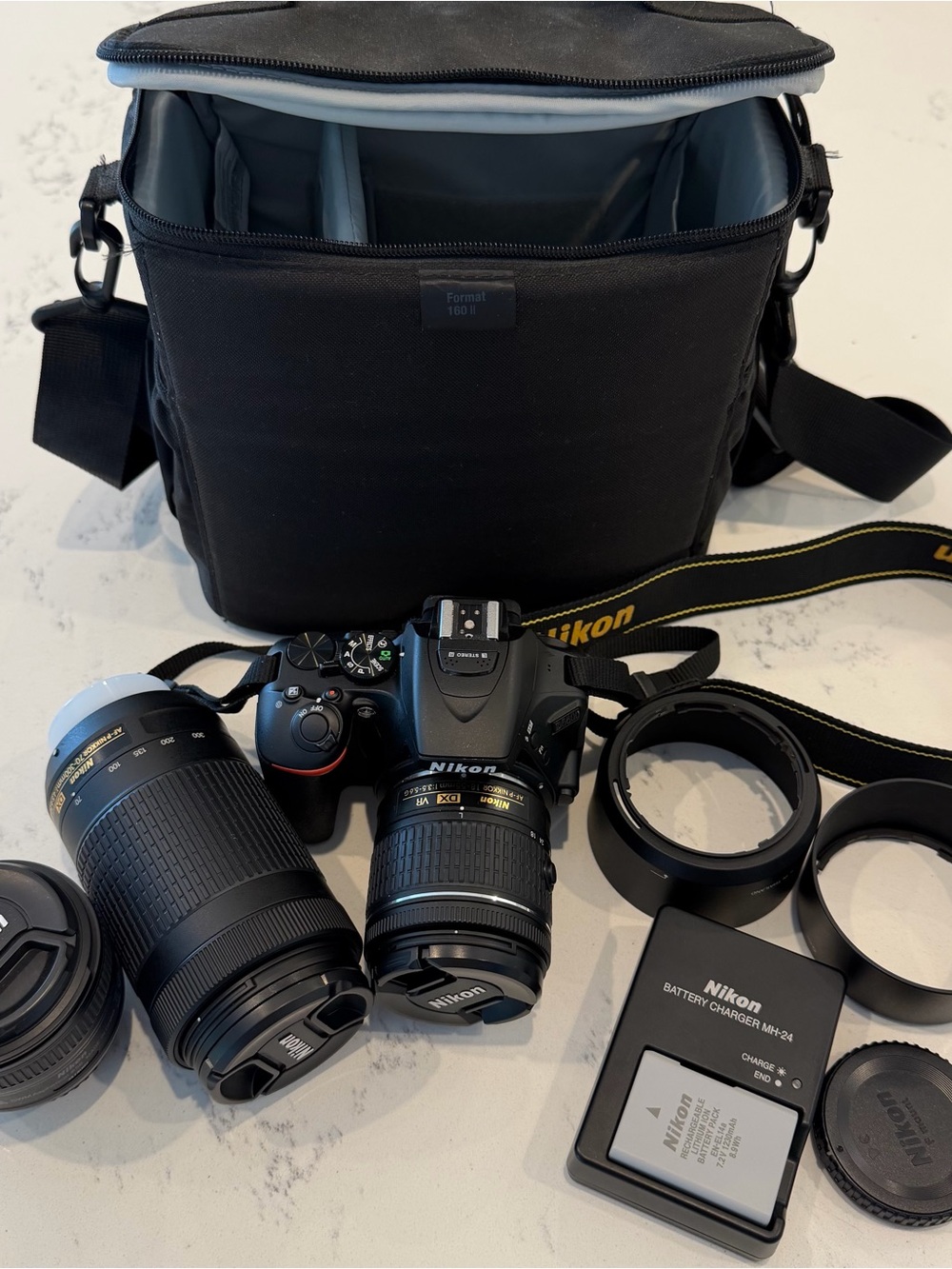 Nikon D5600 Black DSLR Camera Kit with 18-55mm, 70-300mm, and 50mm f/1.8G Lenses